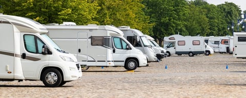 Campervans parked in row