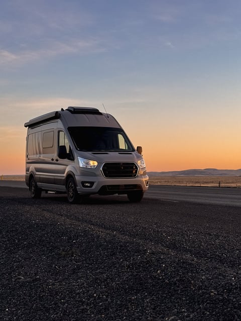 Luxury Class A motorhome on Iceland road at sunrise